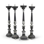 FOUR METAL CANDLESTICKS, SOUTH ITALY 19TH CENTURY in black lacquer, with drums and reels