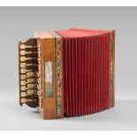 ORGANETTO DIATONICO, 20TH CENTURY with box in maple and pressed paper. Sopranos & Children,