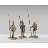 THREE TIN SOLDIERS IN SILVER, 20TH CENTURY