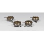 FOUR SILVER SALTCELLAR, Hall mark Birmingham 1901 with body chiseled to motives for leaves and