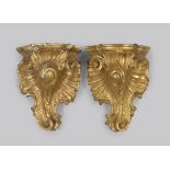 A PAIR OF SMALL GILDED WOOD SHELVES, LOUIS XV PERIOD carved roccailles, leaves and curls. Measures