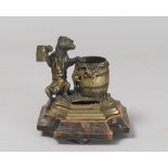 BRONZE INK POT, 19TH CENTURY placed side by side by figure of dog with tankard. Wood base.