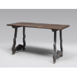 WALNUT TABLE, CENTRAL ITALY 18TH CENTURY with plain rectangular and legs to double volute with