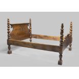 WALNUT BED, ELEMENTS OF THE 17TH CENTURY with back engraved to leaves and coat of arms, uppercuts to