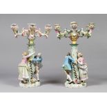 A PAIR OF PORCELAIN CANDLESTICKS, MEISSEN, EARLY 19TH CENTURY in two bodies to six branches with