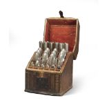 CUTTLERY CASE, 18TH CENTURY covered with leather engraved in gold. Inside cutlery set consists of