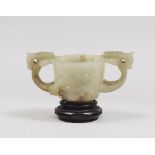 A CHINESE JADE CUP, END 19TH CENTURY Measures cm. 4,5 x 10,5 x 5,5. PICCOLA COPPA IN GIADA, CINA