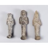 THREE USHABTI, EGYPT I MILLENNIUM B.C. polished shale. The mummy figures are upright, with his