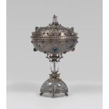 A WONDERFUL SILVER AND CRYSTAL CUP, PROBABLY GERMANY 18TH CENTURY with tub and lid embossed motif of