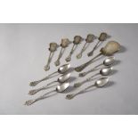 SET OF GILDED SILVER FROM DESSERT, EARLY 20TH CENTURY with handles chiseled to in bloom racemi and