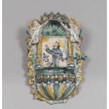 MAJOLICA STOUP, SOUTH ITALY LATE 19TH CENTURY polychrome, with decor in the figure of the Holy and