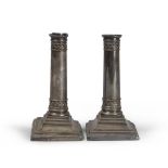 A PAIR OF SMALL SILVER CANDLESTICKS, EARLY 20TH CENTURY h. cm. 17, gross weight gr. 996. Lacks and