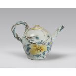 A SMALL MAIOLICA TEAPOT, PROBABLY IMOLA LATE 18TH CENTURY to white enamel with decorums to flowers