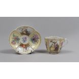 PORCELAIN CUP AND SAUCER, MEISSEN LATE 19TH CENTURY white enamel with polychrome decorations