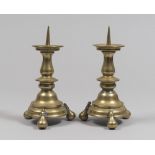 A PAIR OF GILDED BRONZE CANDLESTICKS, EARLY 20TH CENTURY shank and feet turned to the flask.