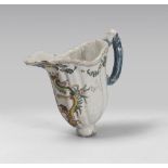 FRAGMENT OF MAIOLICA SPOUT, PROBABLY CERRETO, 18TH CENTURY in polychrome, with decorum to coat of
