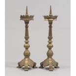 A RARE PAIR OF BRONZE CANDLESTICKS, NORTHERN ITALY 19TH CENTURY to gilded patina, with stems to