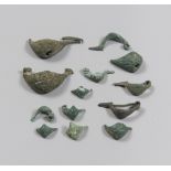 THIRTEEN ETRUSCAN BRONZE FIBULAS, 8TH-6TH CENTURY B.C. to the spacecraft from the arc enlarged and