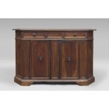 A NOTCHED WALNUT CUPBOARD, ITALY CENTRAL 18TH CENTURY to two drawers and two counters on the front