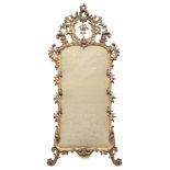 A BEAUTIFUL GILDED WOOD FRAME OF MIRROR, TUSCAN 18TH CENTURY elegantly carved to volutes, curls,