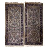 COUPLE OF BED RUG KIRMAN, HALF 20TH CENTURY Measures cm. 137 x 60. COPPIA DI SCENDILETTO KIRMAN,