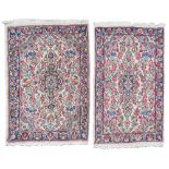 COUPLE OF BED RUG KIRMAN, MID 20TH CENTURY with sketch to forest of flowers. Measures cm. 97 xes 59.