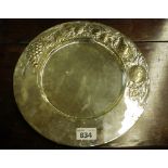 DISH IN SILVER, 20TH CENTURY with stratum hurled to leaves and fruits. Diameter cm. 30, weight gr.