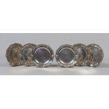 SIX SAUCERS IN SILVER, 20TH CENTURY with edge to volutes and leaves. Diameter cm. 19, weight gr.