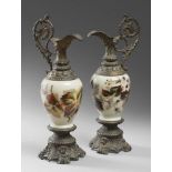 COUPLE OF AMPHORAS IN OPALINES IS BURNISHED METAL, END 19TH CENTURY with banister body, decorated to