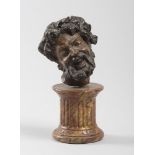 LACQUERED WOOD HEAD OF FAUN, 18TH CENTURY in laughing laying. Column base lacquered to false marble.