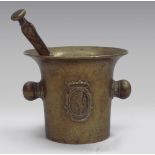 BRONZE MORTAR AND PESTLE, EARLY 20TH CENTURY with coat of arms of lineage to the body. Measures