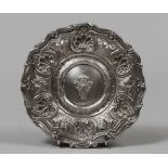 SILVER SAUCER, 19TH CENTURY hurled to real coat of arms and edge to volutes and roccailess. Diameter