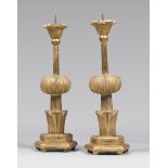 A PAIR OF GILDED WOOD CANDLESTICK, ANCIENT ELEMENTS h. cm. 50. COPPIA DI CANDELIERI IN LEGNO DORATO,