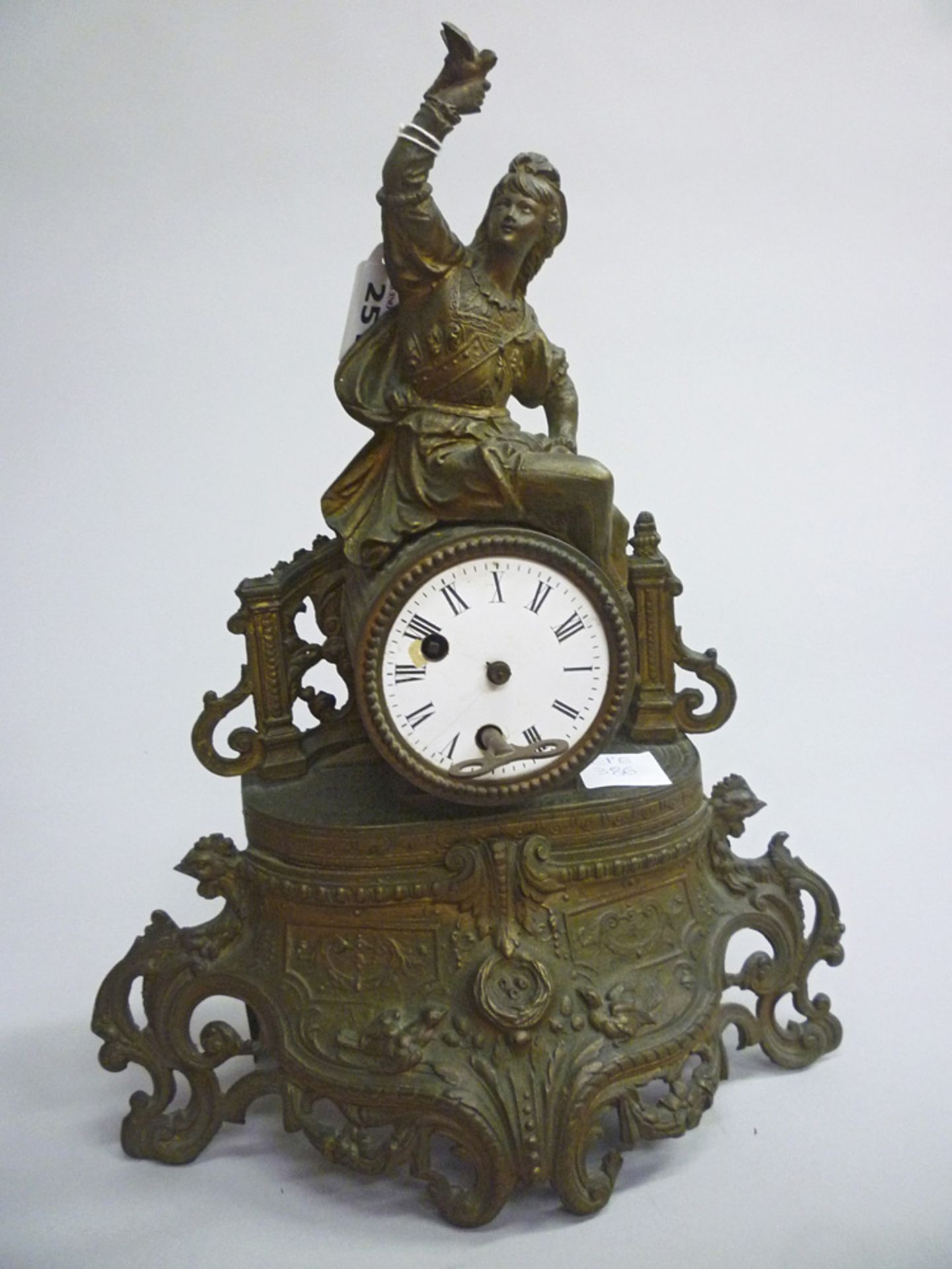 BURNISHED METAL CLOCK, 19TH CENTURY