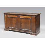 A BEAUTIFUL WALNUT-TREE SIDEBOARD, CENTRAL ITALY 17TH CENTURY with rectangular top and forehead with