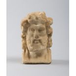 ALABASTER HEAD OF FAUN, 16TH CENTURY carved. Measures cm. 18 x 10 x 75. Lacks. TESTA DI FAUNO IN