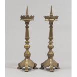 A RARE PAIR OF BRONZE CANDLESTICKS, NORTHERN ITALY 19TH CENTURY to gilded patina, with stems to