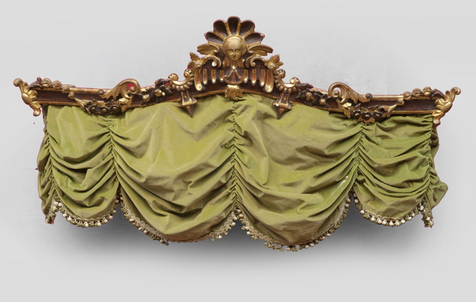 GILTWOOD AND BROWN LACQUERED CURTAIN-HOLDER, NAPLES ELEMENTS OF BAROQUE PERIOD carved to the front