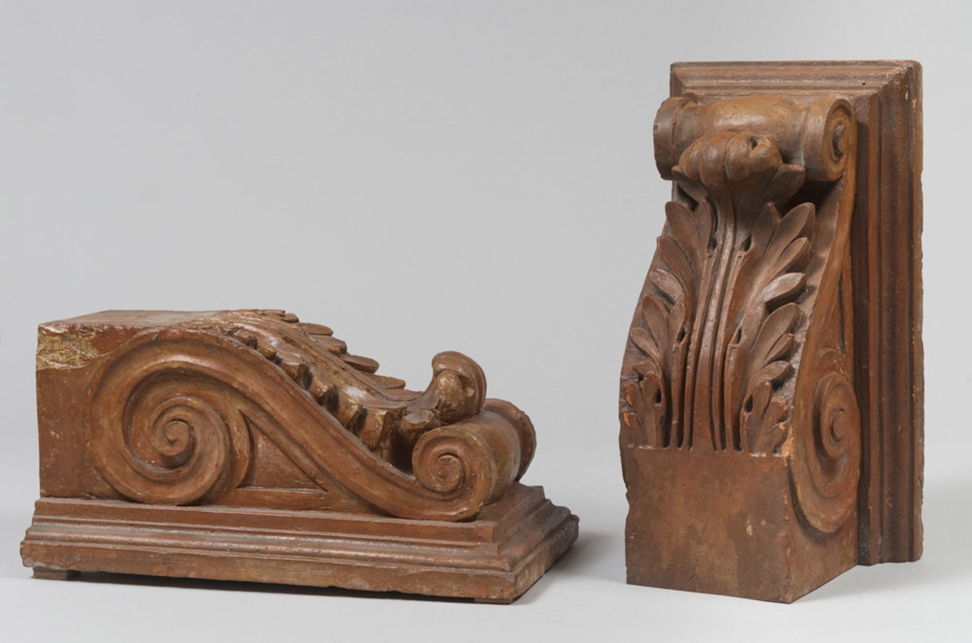 A PAIR OF EARTHENWARE FRIEZES, 19TH CENTURY to light brown lacquer, representing shelves with
