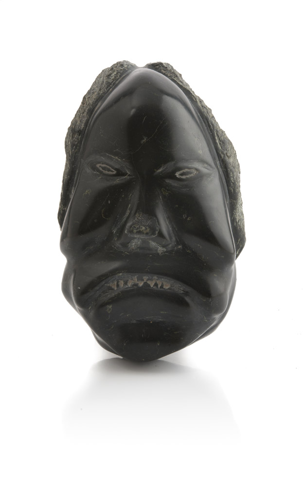 A SOAPSTONE SCULPTURE OF A FACE, ESKIMO ART 20TH CENTURY