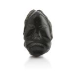 A SOAPSTONE SCULPTURE OF A FACE, ESKIMO ART 20TH CENTURY