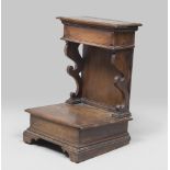 WALNUT-TREE KNEELING-STOOL, CENTRAL ITALY EARLY 18TH CENTURY with volute uprights, mobile top.