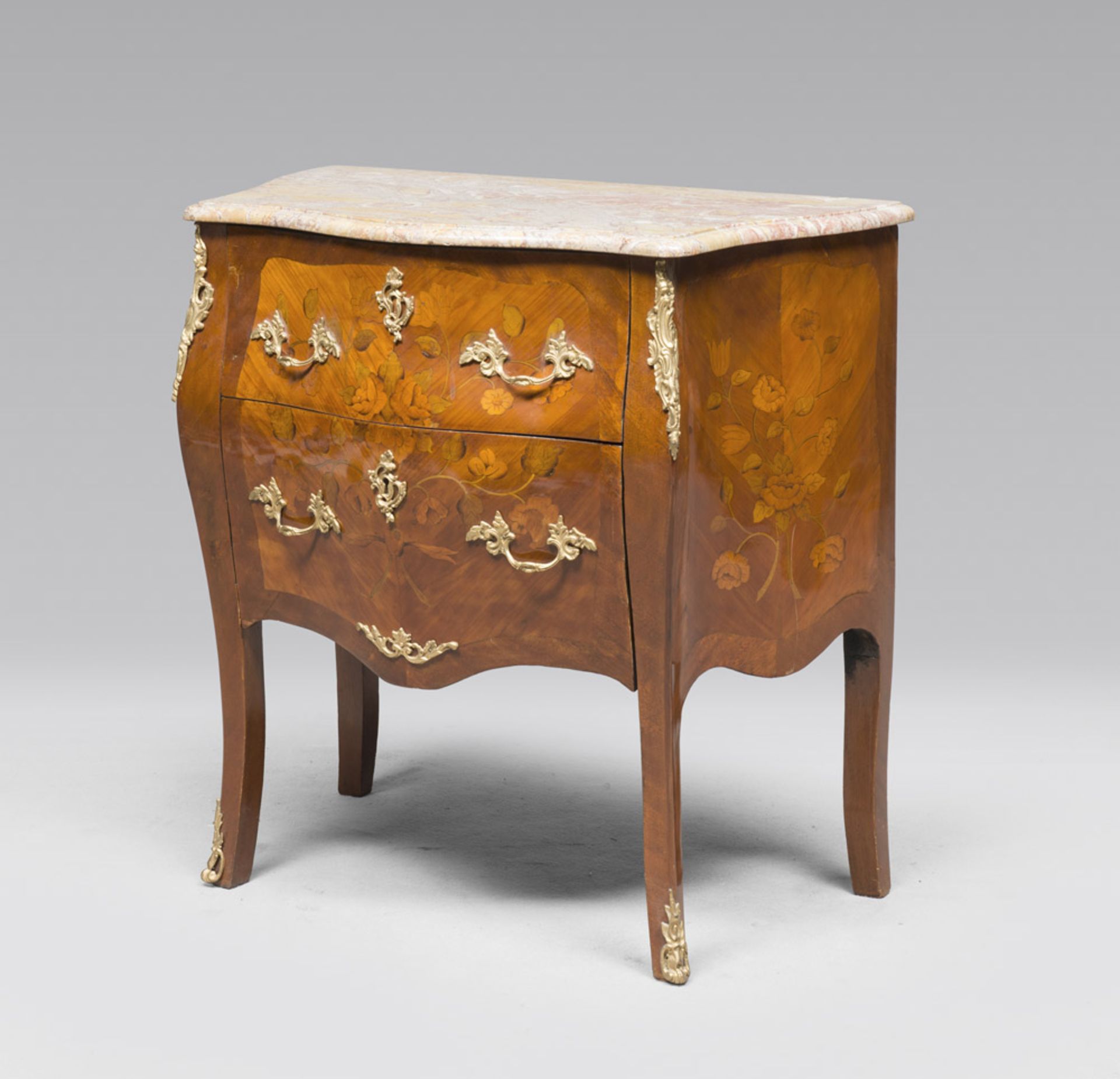 A SMALL BOIS DE ROSE COMMODE, FRANCE ANTIQUE ELEMENTS With a yellow lumachino marble top and a two-