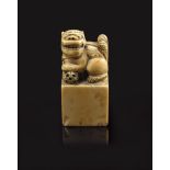 A CHINESE CARVED IVORY SEAL, EARLY 20TH CENTURY