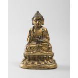 A CHINESE GILDED BRONZE SCULPTURE, 18TH CENTURY depicting Buddha. Measures cm. 9 x 6,5 x 3,5.