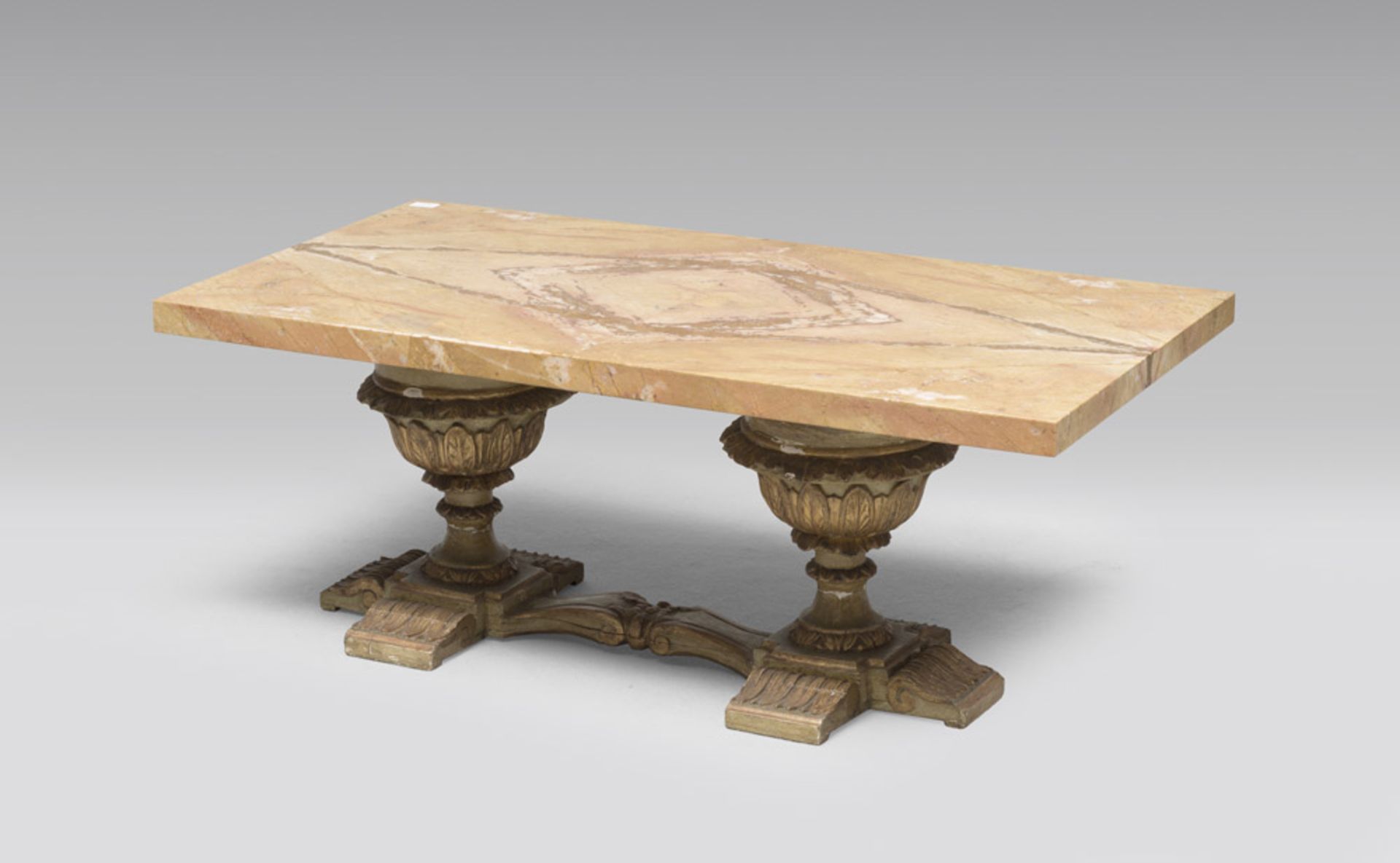 Table from living room with plain in yellow marble and base in wood, 20th century. Measures cm. 45 x