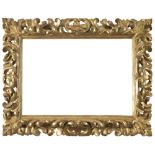 Giltwood frame, central Italy early 18h century. Inner measures, cm. 88 x 48.CORNICE IN LEGNO