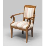 Elm armchair, period of the Biedemaier. Measures cm. 84 x 56 x 59.POLTRONCINA IN OLMO, PERIODO DEL