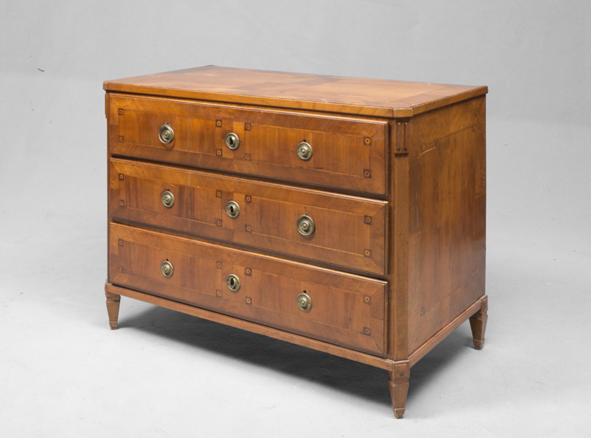 Cherry-wood Commode with maple and violet ebony inlays, period of the Biedermaier. Measures cm. 92 x