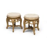 A pair of gilded wood stools with white satin seats, probably France 18th century. Measures cm. 55 x